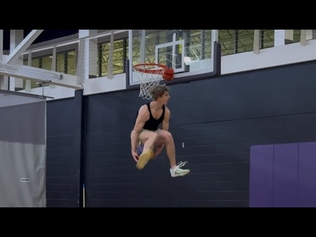 Cam Hazzard 360 under-both dunk on a regulation hoop