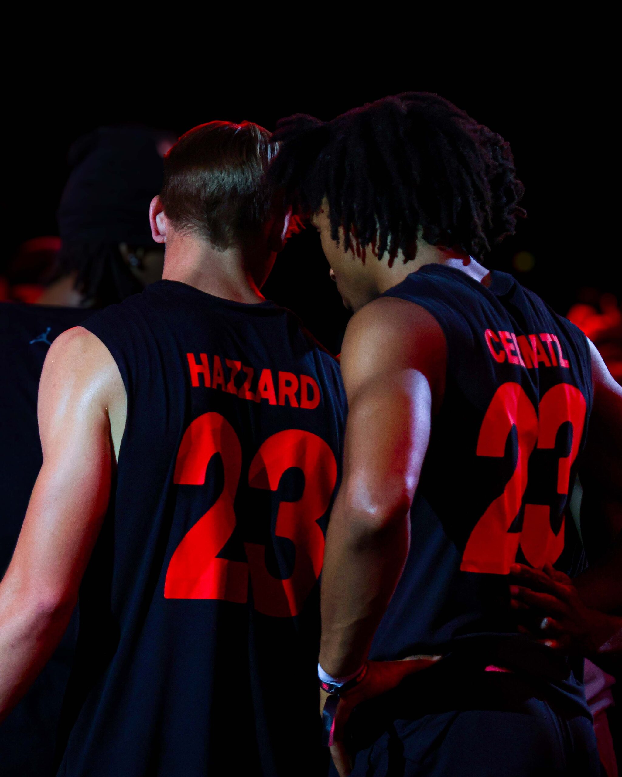 Cam Hazzard face to face with another dunker before a contest