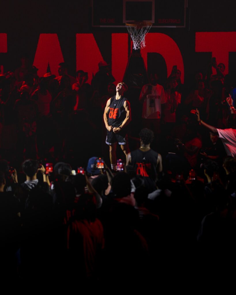 Cam Hazzard celebrating under the rim at the Jordan Brand The One Euro Finals event