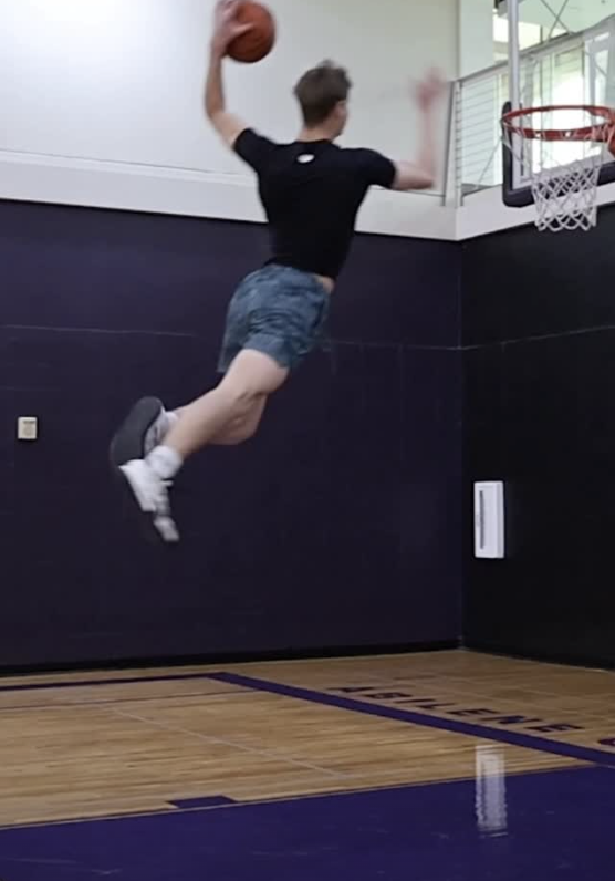 Cam Hazzard mid-air at practice